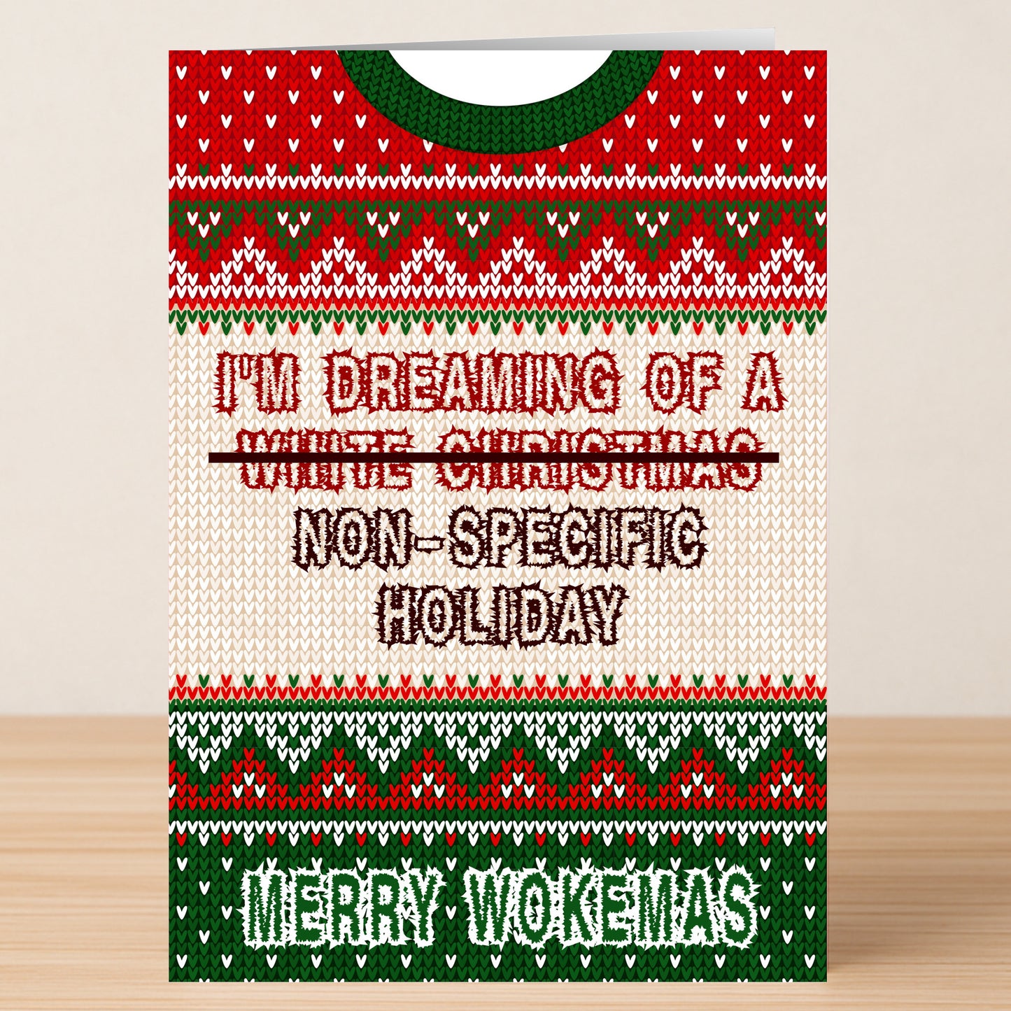 The Non specific Christmas Card by Twisted Gifts features a funny knitted sweater design with "I’m dreaming of a ~White Christmas~ Non-Specific Holiday. Merry Wokemas" in festive red, white, and green.