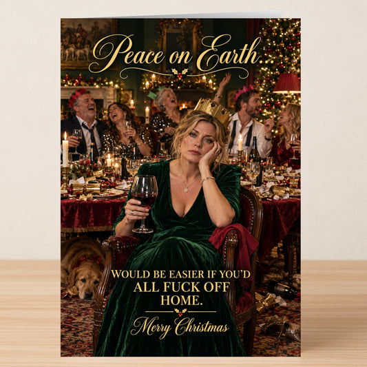A woman in a crown and green dress sits at a festive dinner table looking unimpressed on this Peace On Earth - Funny Christmas Card, which reads: “Peace on Earth... WOULD BE EASIER IF YOU’D ALL FUCK OFF HOME.”