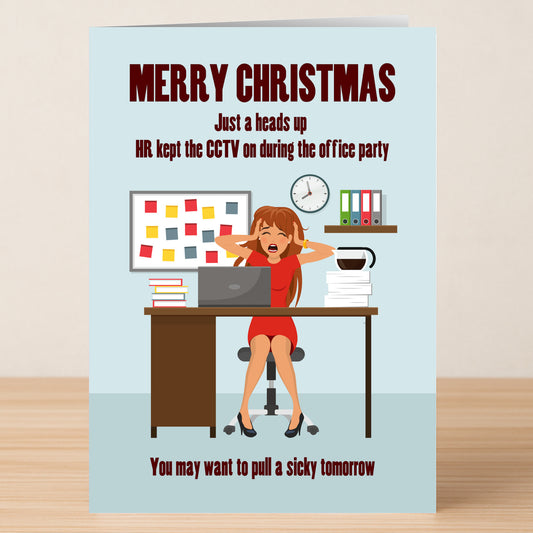 The Twisted Gifts CCTV Rude Christmas Card shows a frazzled woman at her desk with the message: "Merry Christmas. FYI, HR left the CCTV on at the office party—might want to call in sick tomorrow!.