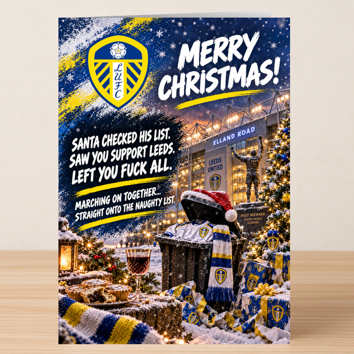 Leeds United – Funny Christmas Card featuring a stadium and the text: “Merry Christmas! Santa checked his list. Saw you support Leeds. Left you fuck all. Marching on together...”