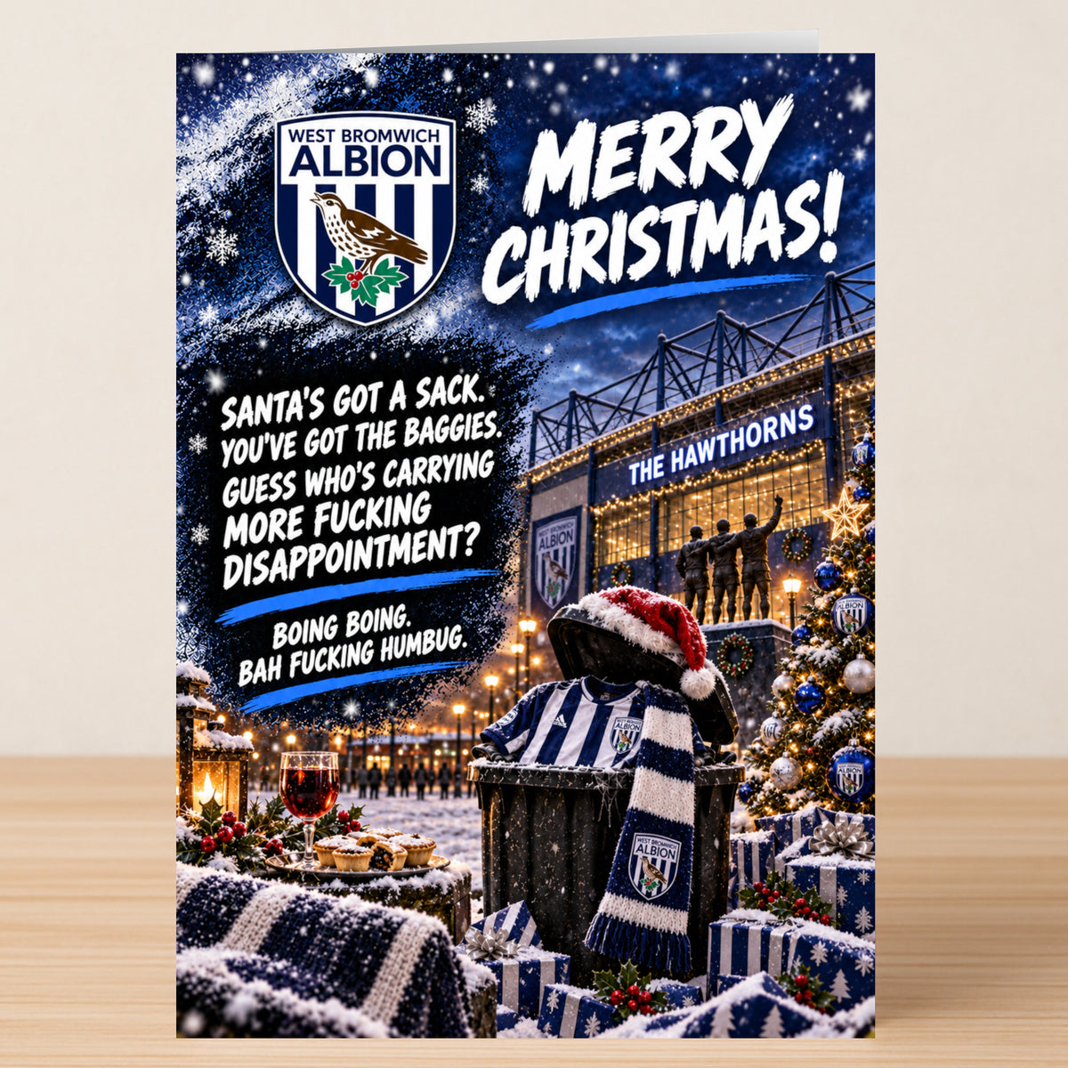 A West Bromwich Albion – Funny Christmas Card featuring the club logo and stadium, with text questioning who carries more disappointment: Santa’s sack or the Baggies.