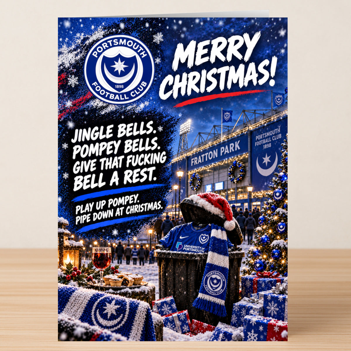 Portsmouth – Funny Christmas Card featuring the Portsmouth Football Club logo, Fratton Park, and the text: “Jingle bells. Pompey bells. Give that fucking bell a rest. Play up Pompey. Pipe down at Christmas.”