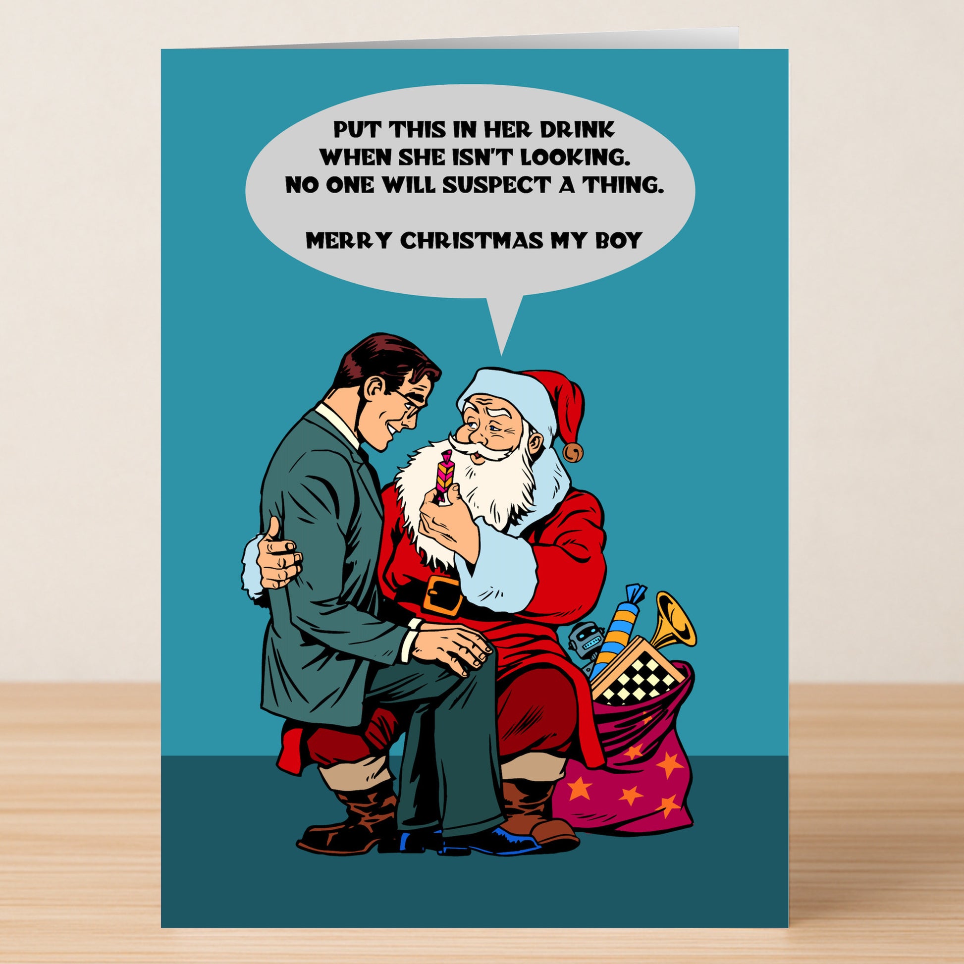 Give your holidays a mischievous twist with the Suspect Rude Christmas Card from Twisted Gifts—a card featuring a suited man on Santa’s lap receiving suspicious advice, perfect for anyone who appreciates edgy Christmas humor!.