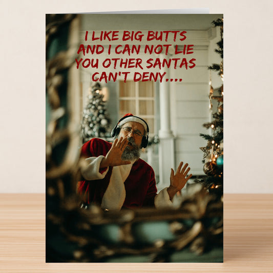 The Big Butts Rude Christmas Card by Twisted Gifts features Santa dancing in headphones by a tree with the text: "I LIKE BIG BUTTS AND I CAN NOT LIE YOU OTHER SANTAS CAN'T DENY....." A hilarious and cheeky holiday card.