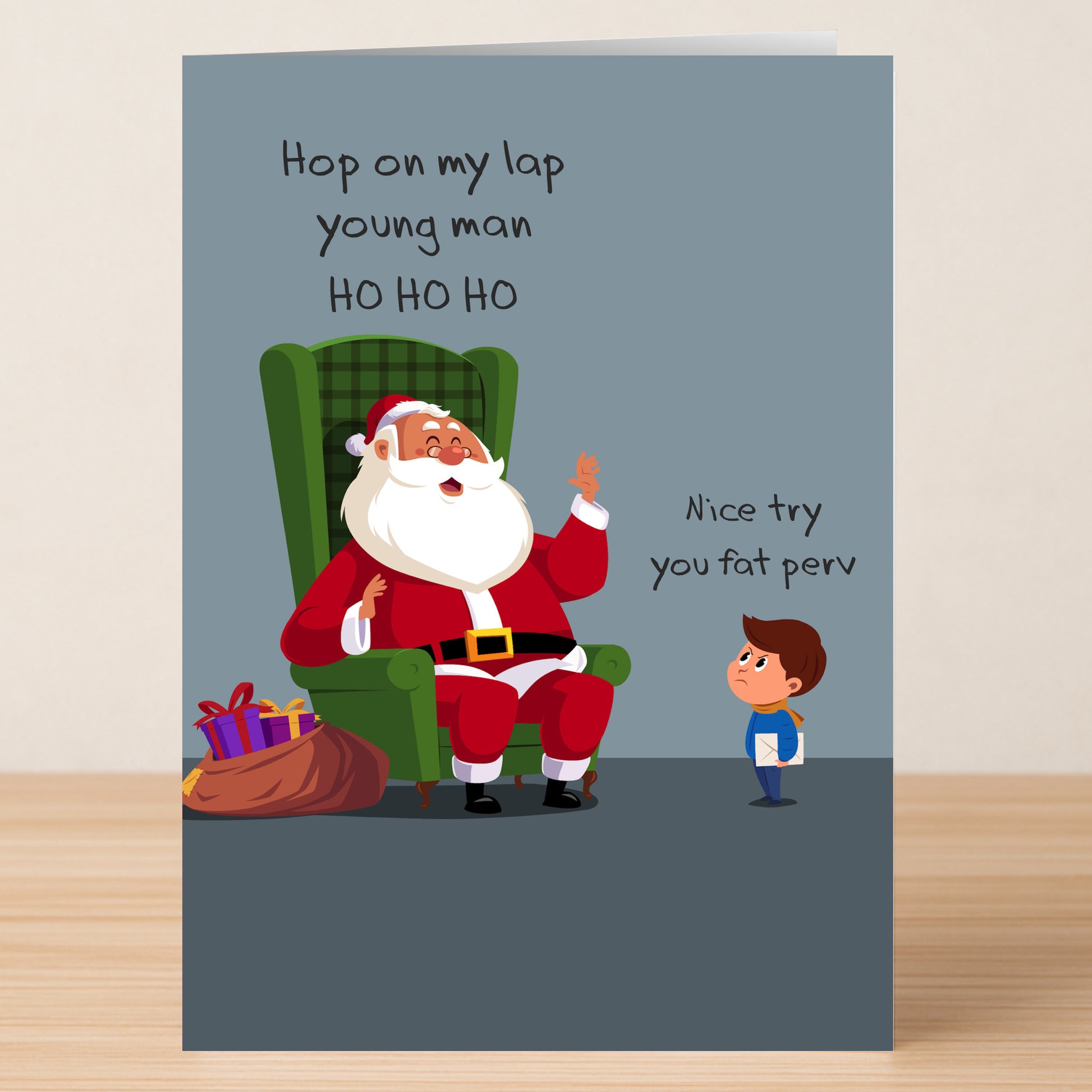 The Nice Try Funny Christmas Card from Twisted Gifts features a cartoon Santa in a green chair offering his lap to a boy, who responds with a skeptical look and sarcastic text—a hilarious way to add humor to your holiday greetings.