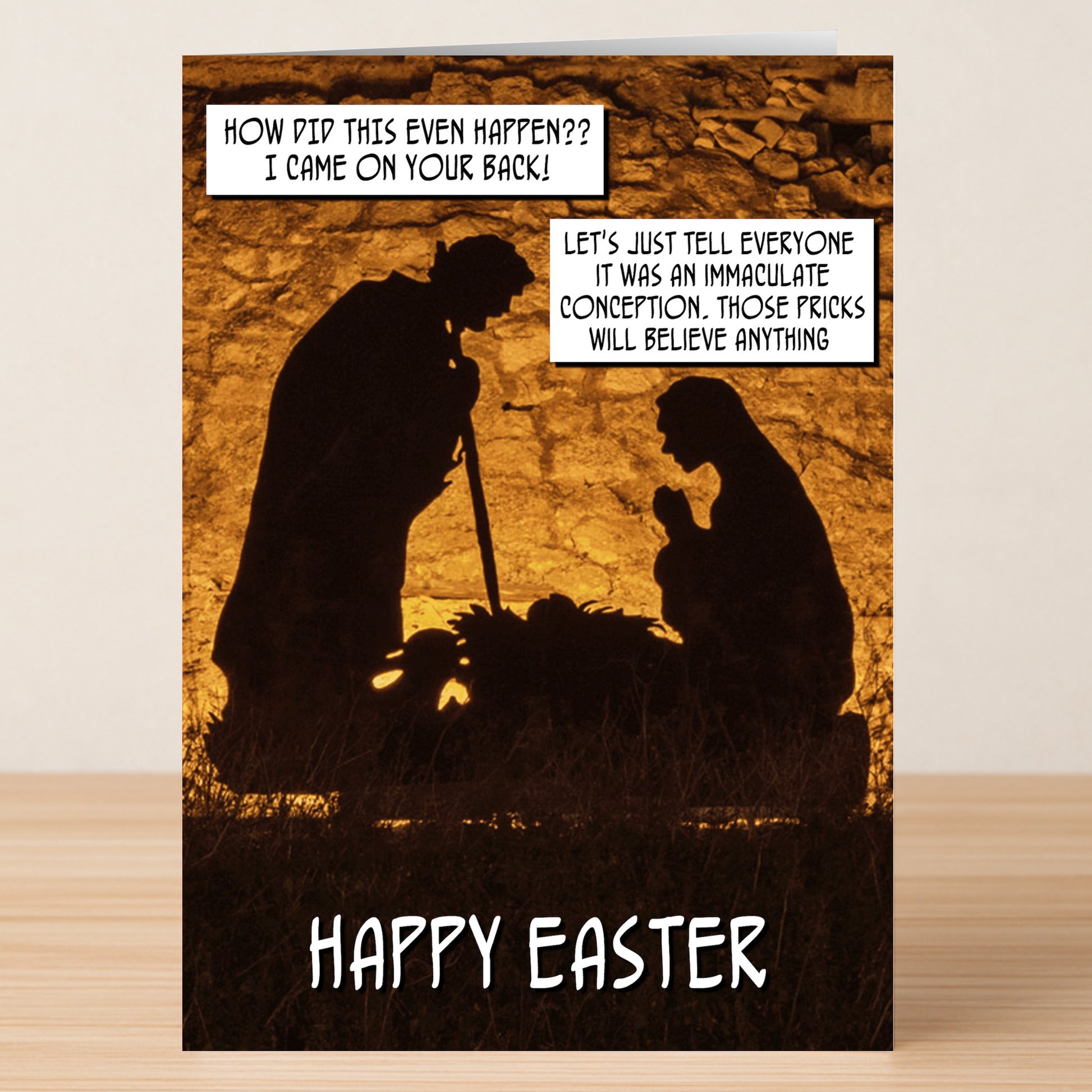 The Believe Anything Insulting Easter Card by Twisted Gifts features silhouettes of two people and a baby in a manger, with irreverent speech bubbles and "Happy Easter" text for a humorous, tongue-in-cheek holiday greeting.