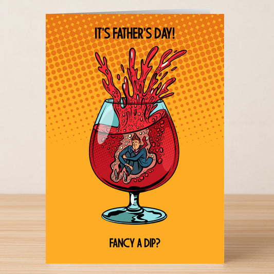 The Fancy A Dip Funny Father's Day Card by Twisted Gifts features a man in a splashing glass of red liquid and the message "IT'S FATHER'S DAY! FANCY A DIP?" on an orange dotted background.
