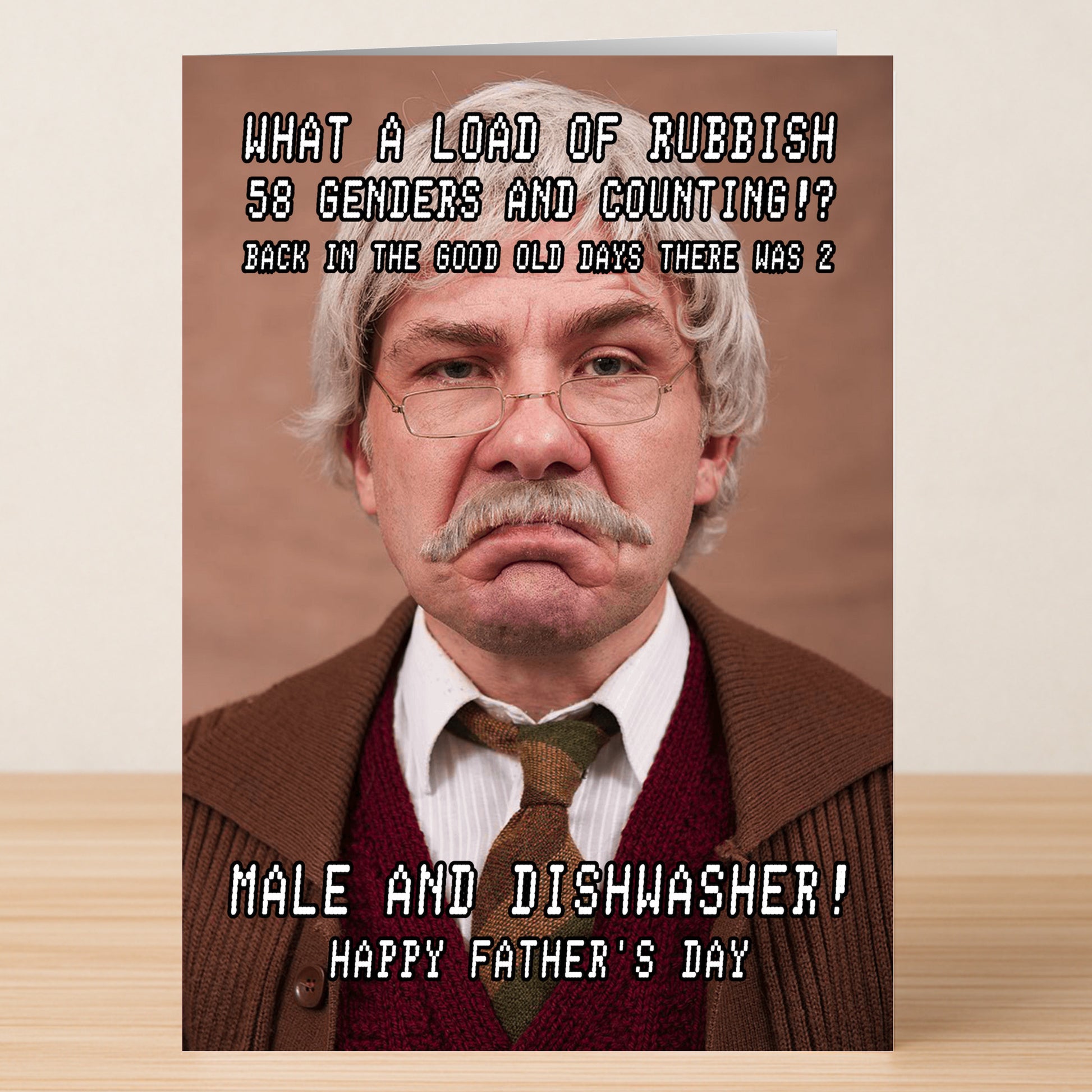 The Genders Funny Father's Day Card by Twisted Gifts features an older man with glasses and a fake mustache, delivering satirical jokes about gender and household roles—perfect for Father's Day laughs.