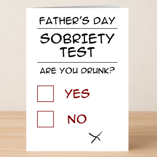 The Sobriety Funny Father's Day Card by Twisted Gifts features checkboxes asking "Are you drunk?" with a random mark under "NO," adding a playful touch for those celebrating sober life.
