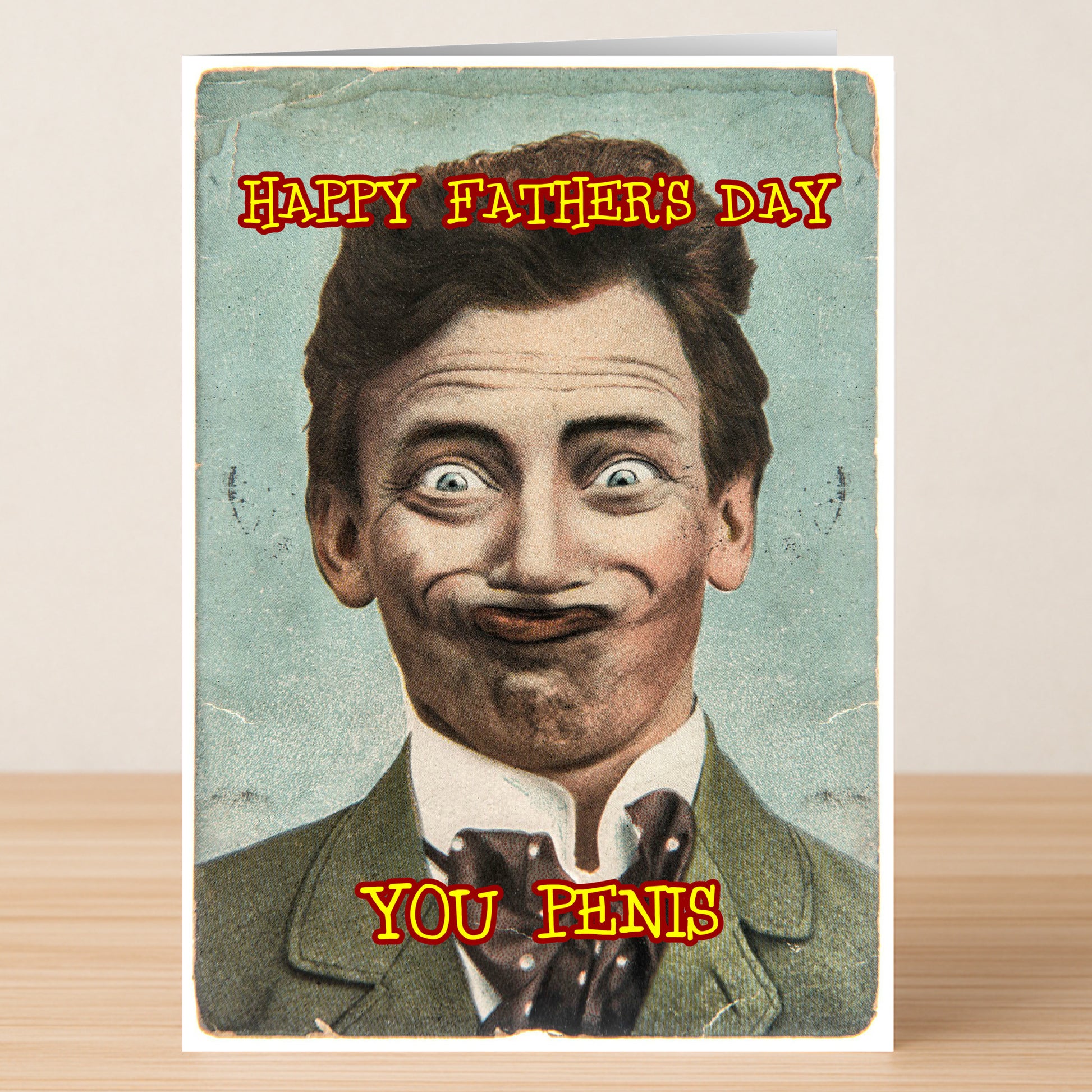 The "You Penis Insulting Father's Day Card" by Twisted Gifts is a vintage-style card with a distorted man's face and the bold red and yellow caption, "Happy Father's Day, You Penis.