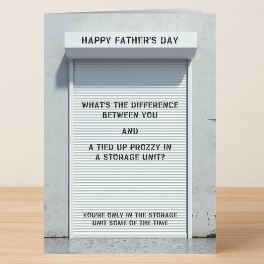 The Storage Unit Funny Father's Day Card by Twisted Gifts features a white storage unit door with "Happy Father's Day" above and a witty joke comparing time spent in storage to brighten Dad's day.