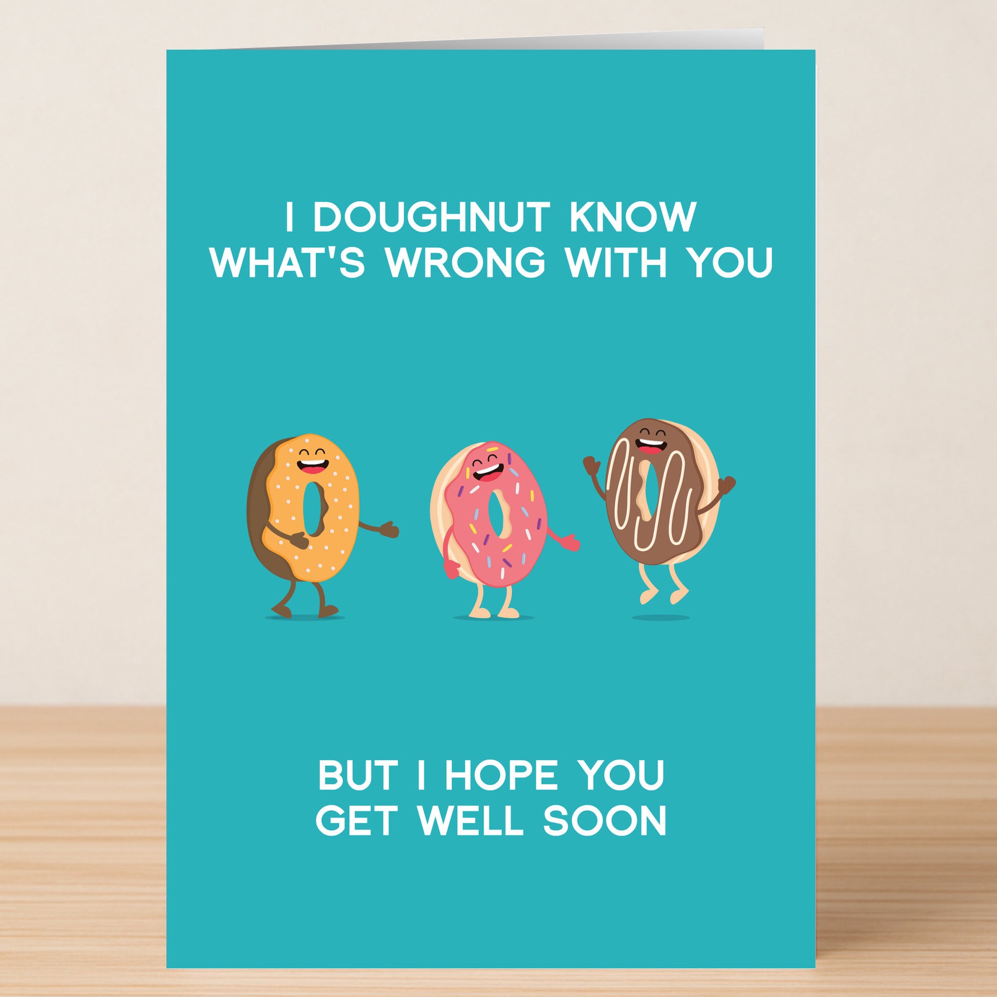 The Doughnut Rude Get Well Soon Card by Twisted Gifts features fun donut illustrations and the message: "I doughnut know what's wrong with you but I hope you get well soon.