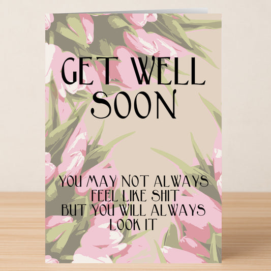 Cheer them up with the "Look Like Shit Insulting Get Well Soon Card" from Twisted Gifts—a pink and green floral card with a cheeky message guaranteed to make anyone laugh.
