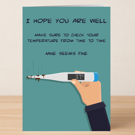 Send well wishes with the Temperature Funny Get Well Soon Card by Twisted Gifts, featuring quirky wordplay: "I hope you are well. Make sure to check your temperature from time to time. Mine seems fine," and a hand holding a dirty thermometer.