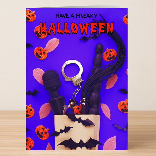 The Freaky Funny Halloween Card by Twisted Gifts features "Have a Freaky Halloween" text, jack-o'-lanterns, bats, and playful adult toy icons on a purple background—a unique card sure to bring grown-up laughs this Halloween!.