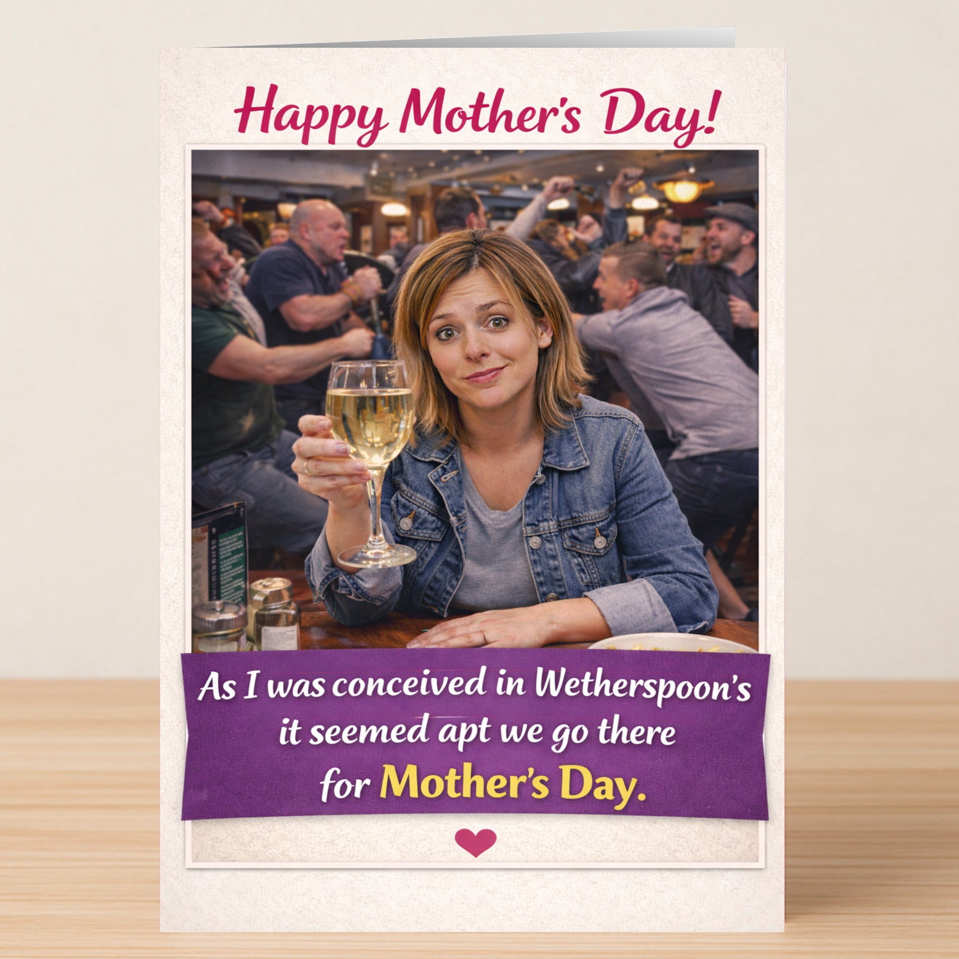The Wetherspoons Mother's Day Card by Twisted Gifts shows a woman with wine in a lively pub and features witty text about being conceived there—making it the perfect funny mum card for Mother’s Day.