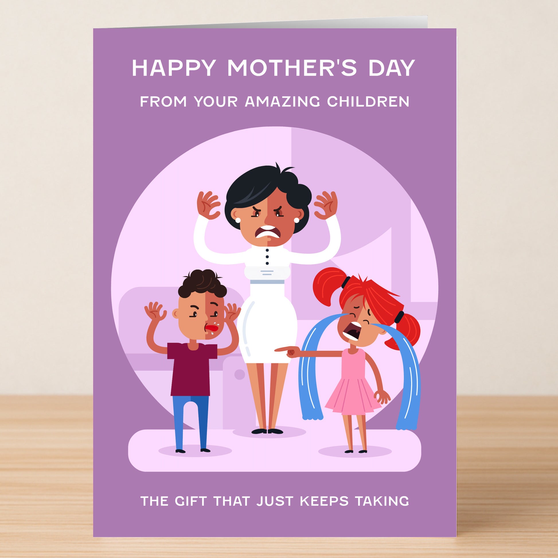 Twisted Gifts' The Gift Funny Mother's Day Card features a frustrated mom with two yelling kids and the caption: “Happy Mother’s Day from your amazing children. The gift that just keeps taking.”.