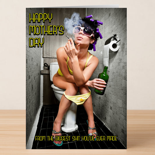 A woman in a bikini with hair rollers sits on a toilet smoking and holding a bottle, with cheeky "Happy Mother's Day" text—Twisted Gifts’ Biggest Shit Rude Mother's Day Card is perfect for sassy moms.