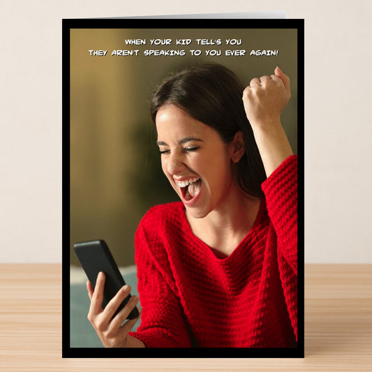 A woman in a red sweater smiles and raises her fist at her phone. Above her: “When your kid tells you they aren’t speaking to you ever again!” The Speak Funny Mother’s Day Card by Twisted Gifts—perfect for laughs.