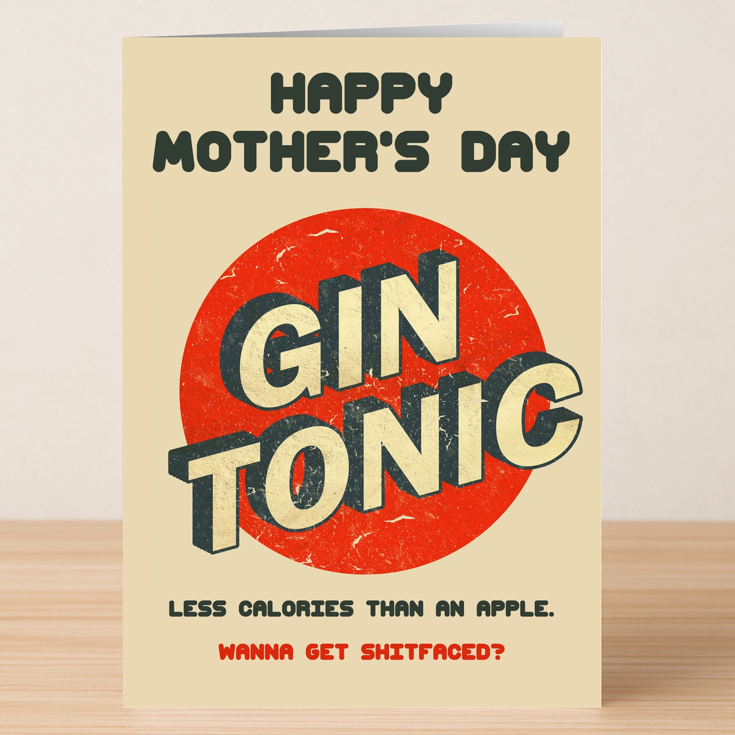 The Calories Funny Mother's Day Card by Twisted Gifts features "Happy Mother's Day" on top, "Gin Tonic" in bold, and a witty calorie-and-drinking joke, shown on a wooden surface.