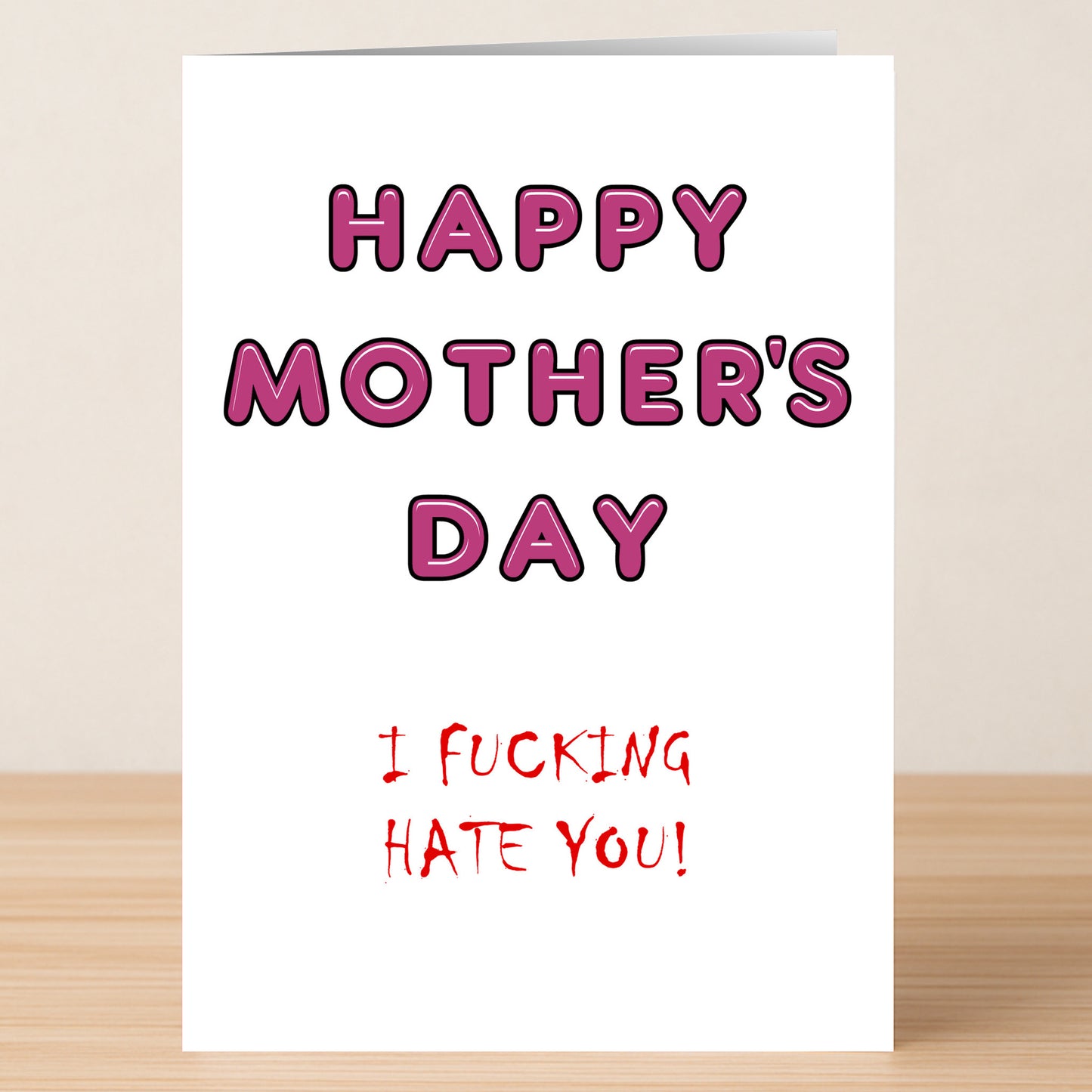 The Hate Insulting Mother's Day Card by Twisted Gifts features "HAPPY MOTHER'S DAY" in bold pink with "I FUCKING HATE YOU!" in red—an edgy, humorous option for those who prefer their greetings with a twist.