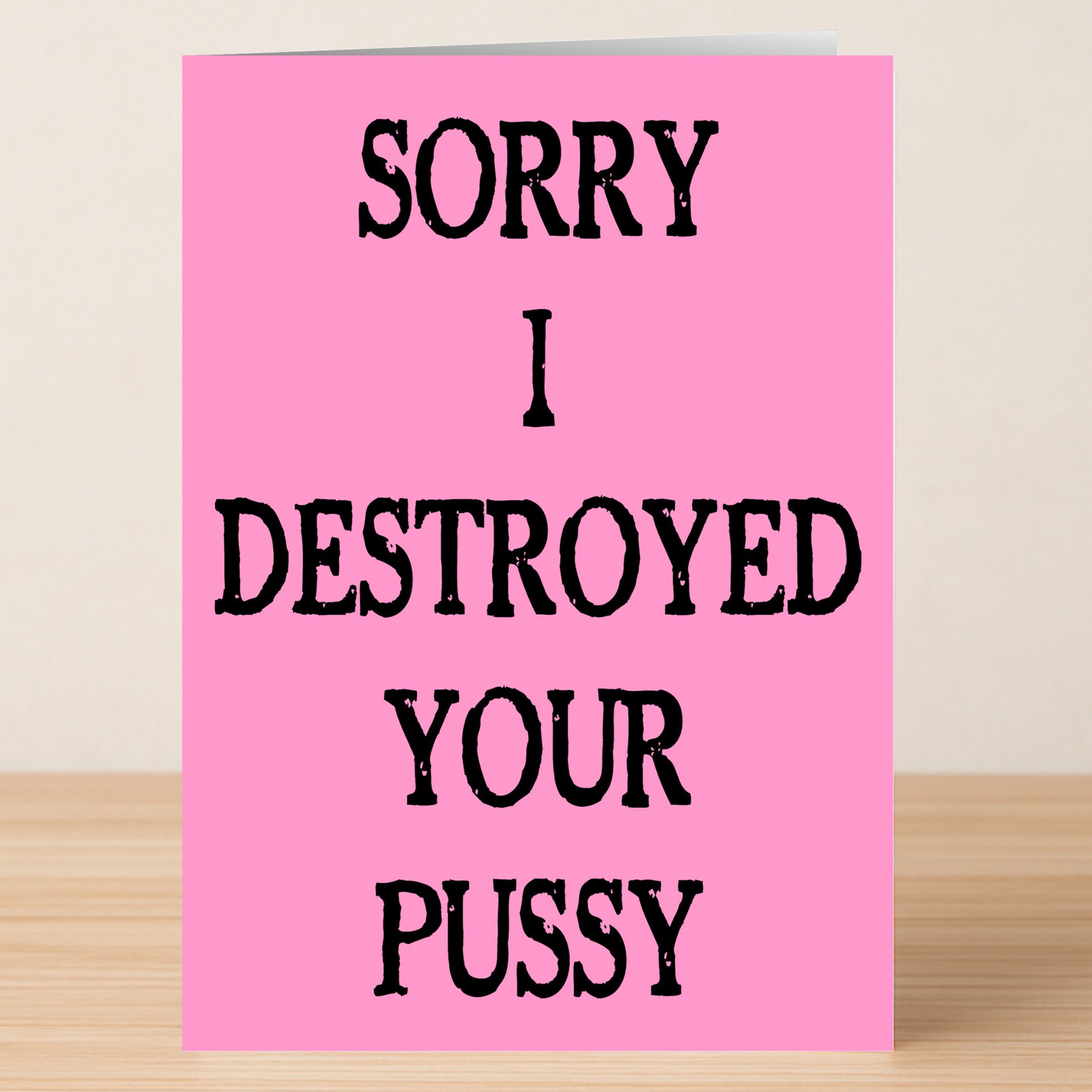 The Destroyed Funny Mother's Day Card by Twisted Gifts features bold black text, "SORRY I DESTROYED YOUR PUSSY," on a pink card—an outrageous and humorous greeting perfect for Mother's Day laughs.