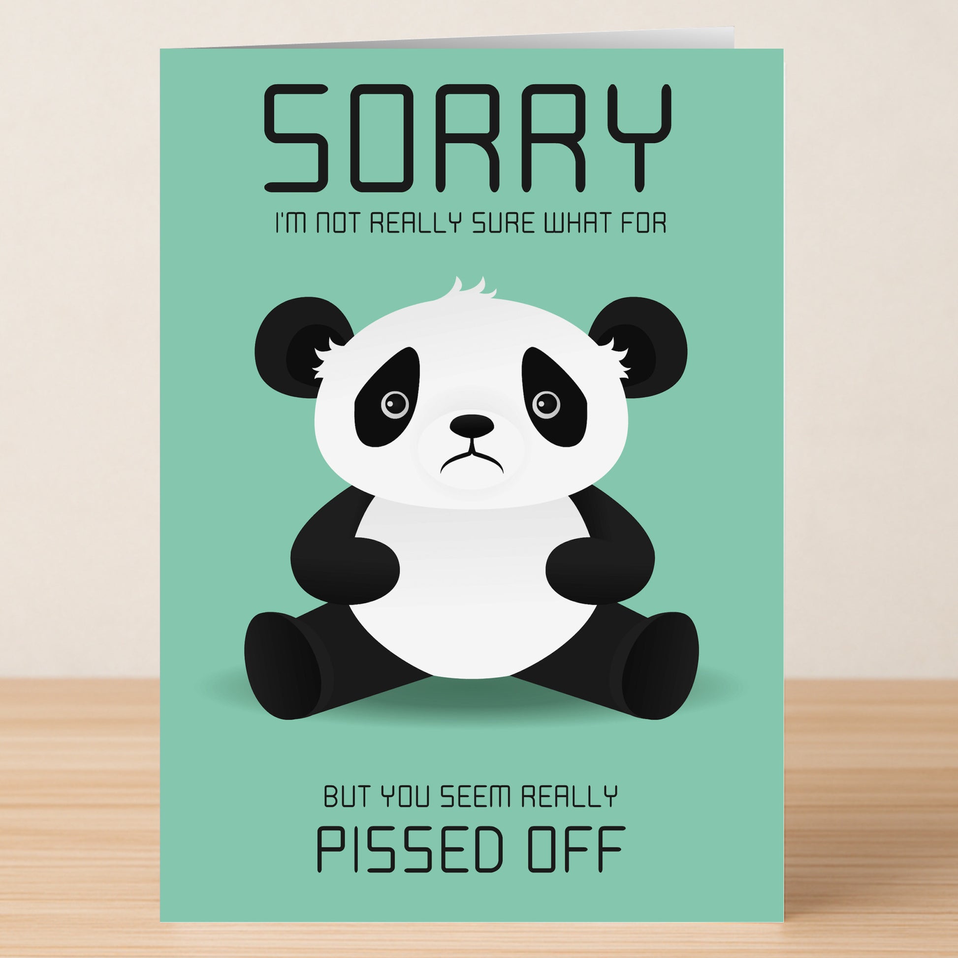The Sorry For Something Funny Sorry Card by Twisted Gifts features a sad cartoon panda and the message: "Sorry I'm not really sure what for but you seem really pissed off." A quirky card for unpredictable moods.