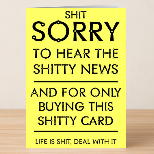 The Shitty News Rude Sorry Card by Twisted Gifts is a bold, humorous yellow apology card with "Life is shit, deal with it."—perfect for quirky, fun apologies or any awkward bad news.