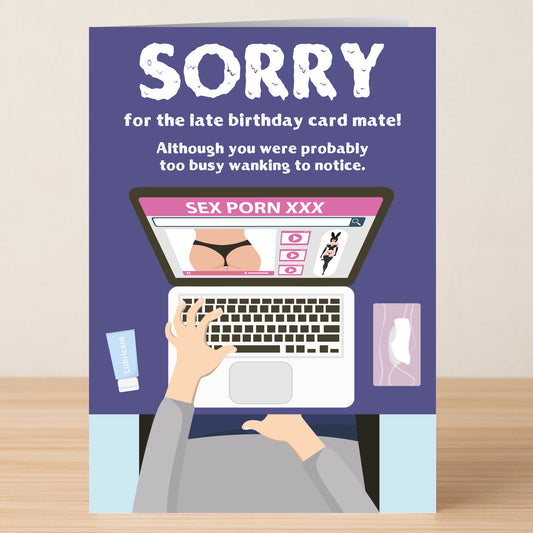 The Too Busy Rude Sorry Card by Twisted Gifts shows someone at their laptop with adult content, lotion, and tissues nearby, humorously apologizing for late birthday wishes with a cheeky message.