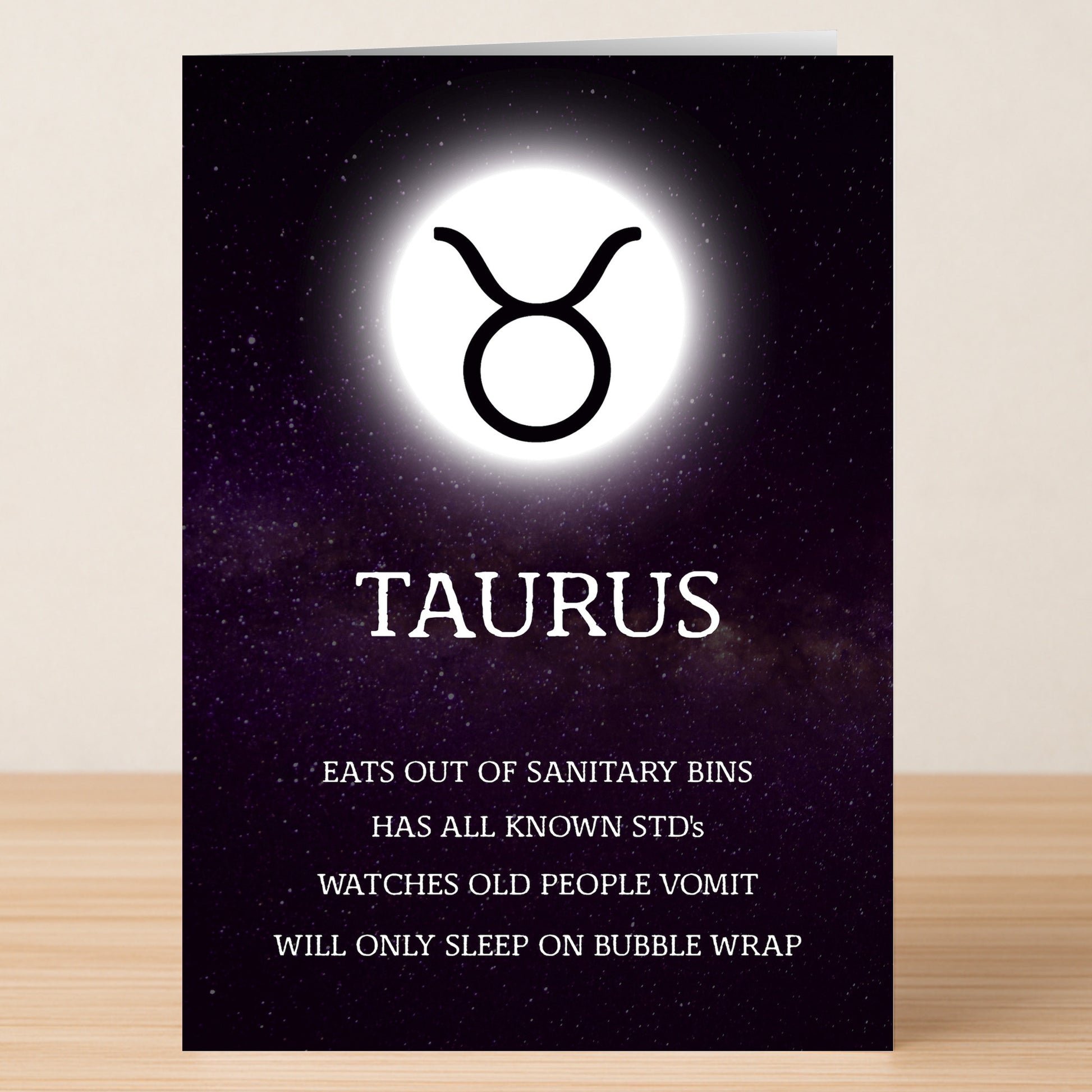 The Taurus Rude Star Sign Card by Twisted Gifts showcases a bold zodiac design with sarcastic text humorously exaggerating Taurus traits—a unique and cheeky greeting card for astrology lovers.