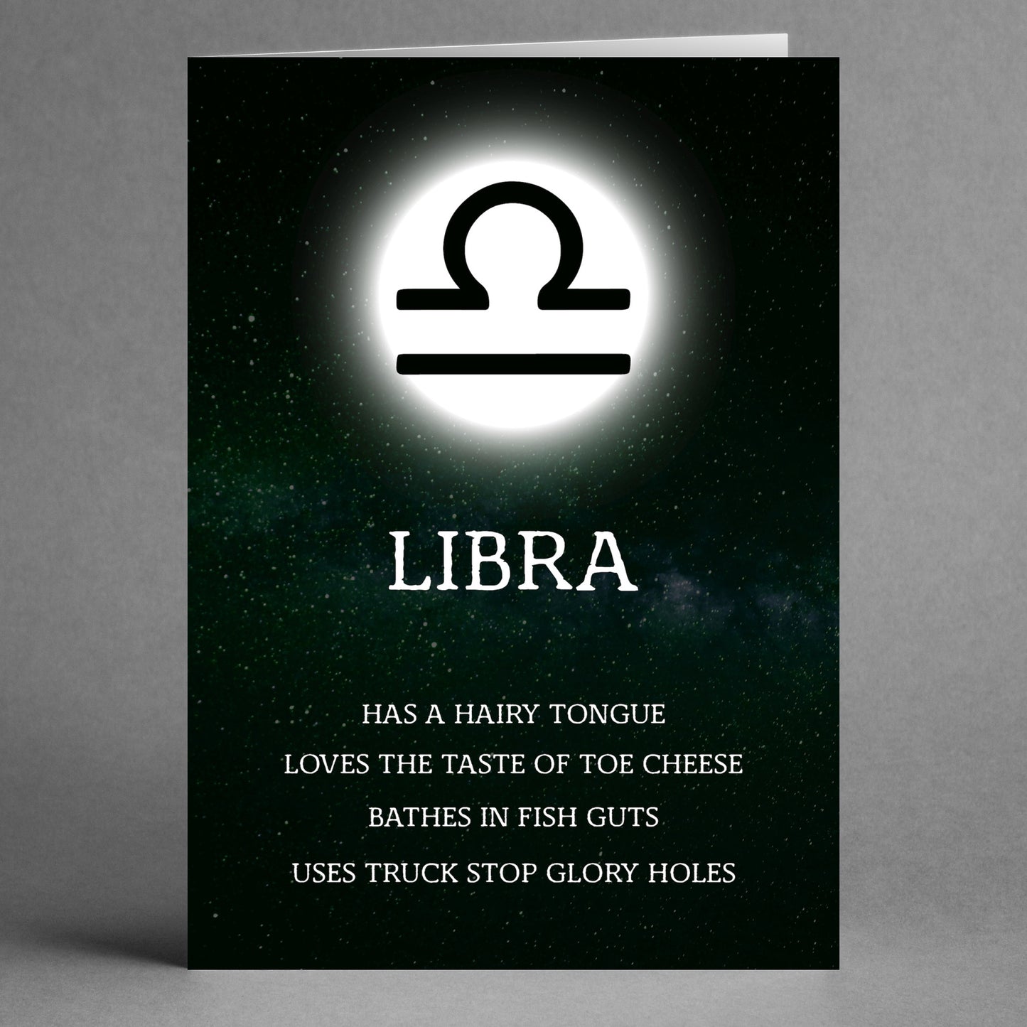 A Libra Rude Star Sign Card from Twisted Gifts humorously highlights quirky traits like "hairy tongue" and "bathing in fish guts," capturing a sassy side that true Libras will appreciate.