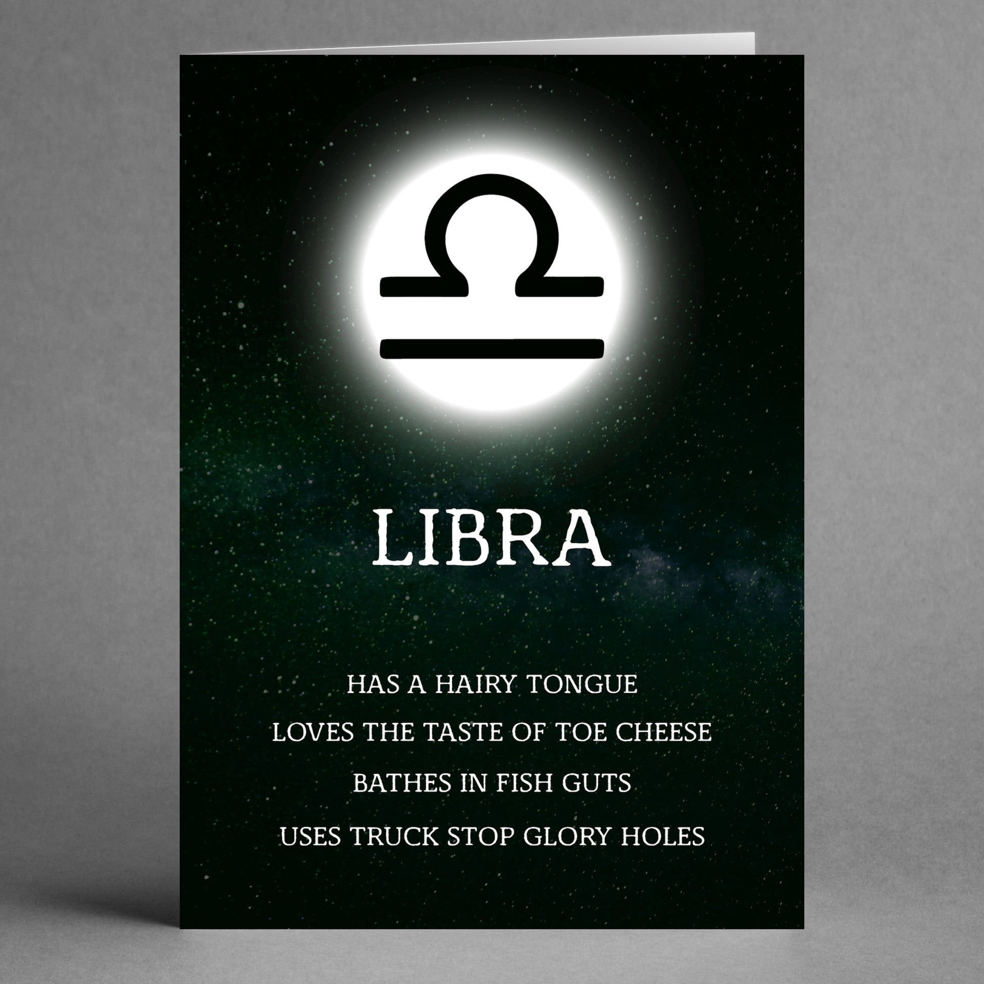 A Libra Rude Star Sign Card from Twisted Gifts humorously highlights quirky traits like "hairy tongue" and "bathing in fish guts," capturing a sassy side that true Libras will appreciate.