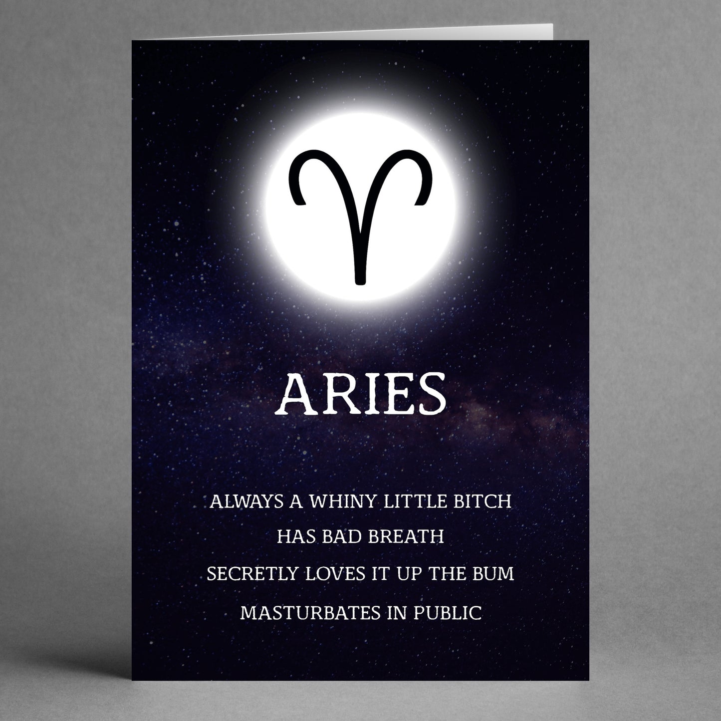 Description of the Aries Rude Star Sign Card by Twisted Gifts: A striking card featuring a glowing Aries symbol and the bold title "ARIES." Beneath it, humorous and provocative text candidly unveils the fiery traits associated with this sign.