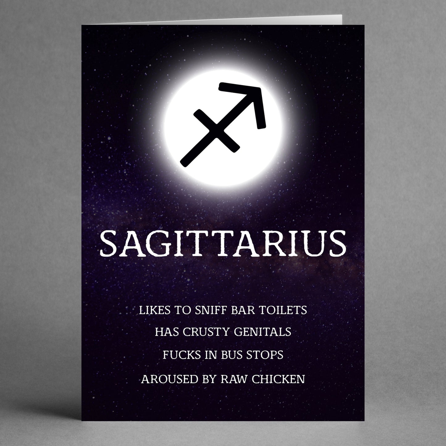 The Sagittarius Rude Star Sign Card by Twisted Gifts showcases the iconic Sagittarius symbol accompanied by humorous, space-themed text about fictional traits. It's an ideal choice for those who enjoy a good laugh and the bold honesty associated with this so-called "rude star sign.