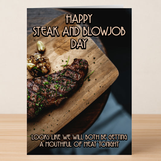 The Mouthful Rude Steak And Blowjob Card by Twisted Gifts is a funny greeting card for Steak and Blow Job Day, with a steak on a cutting board and the playful message: "Looks like we’ll both be getting a mouthful of meat tonight.