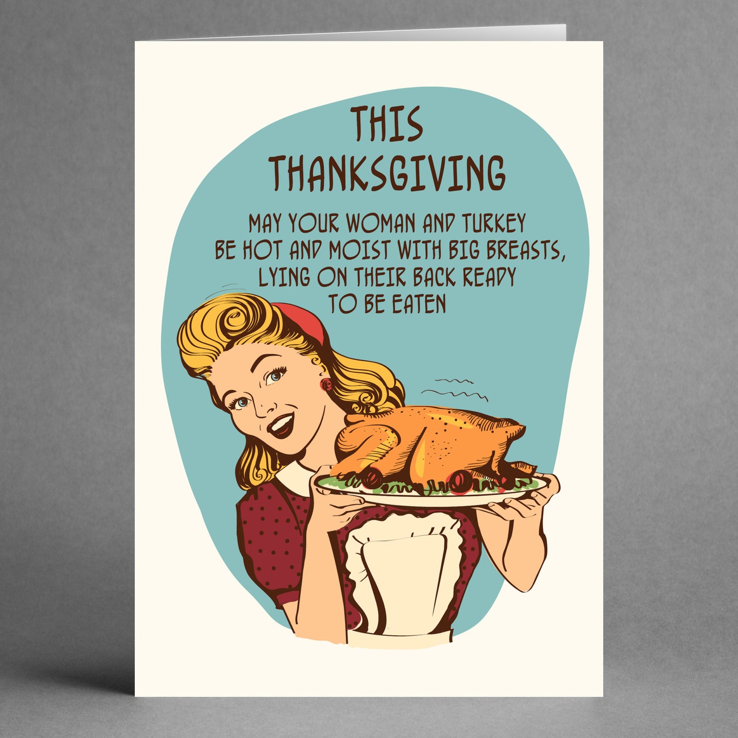 The "This Thanksgiving Rude Thanksgiving Card" by Twisted Gifts features a vintage-style design with a smiling woman holding a cooked turkey, accompanied by a cheeky greeting to bring humor to your holiday celebration.