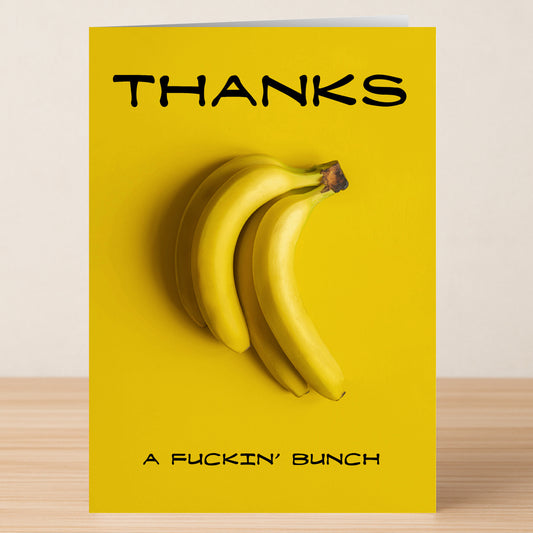The Thanks A Bunch Funny Thank You Card by Twisted Gifts features three bananas on a yellow background with "THANKS" at the top and "A FUCKIN' BUNCH" at the bottom—a bold, humorous way to show your appreciation!.