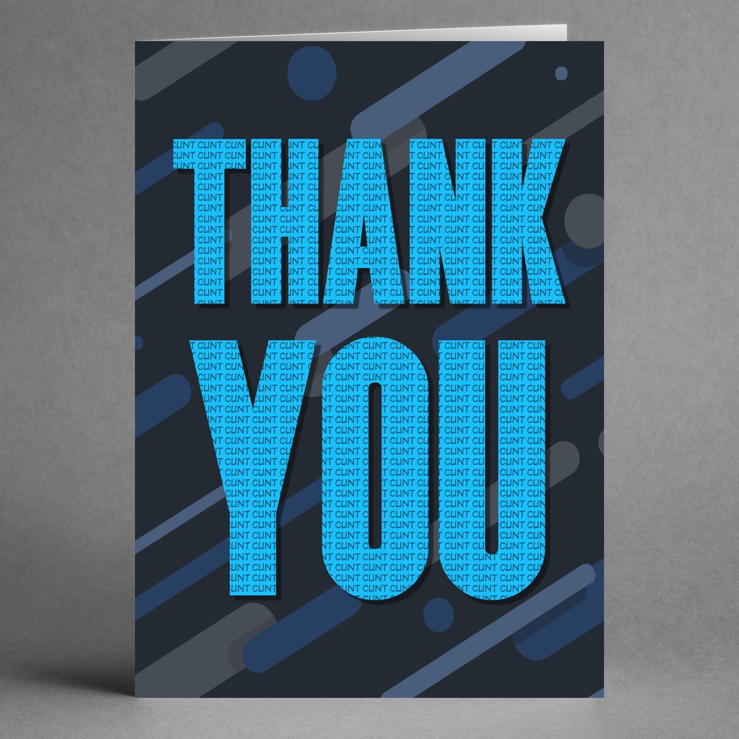 The "Thank You Message Rude Thank You Card" by Twisted Gifts features bold blue "THANK YOU" text overlaid with smaller repeating phrases, set against a dark abstract background with various shapes and gradients, making it just the right choice for delivering a sarcastic message.