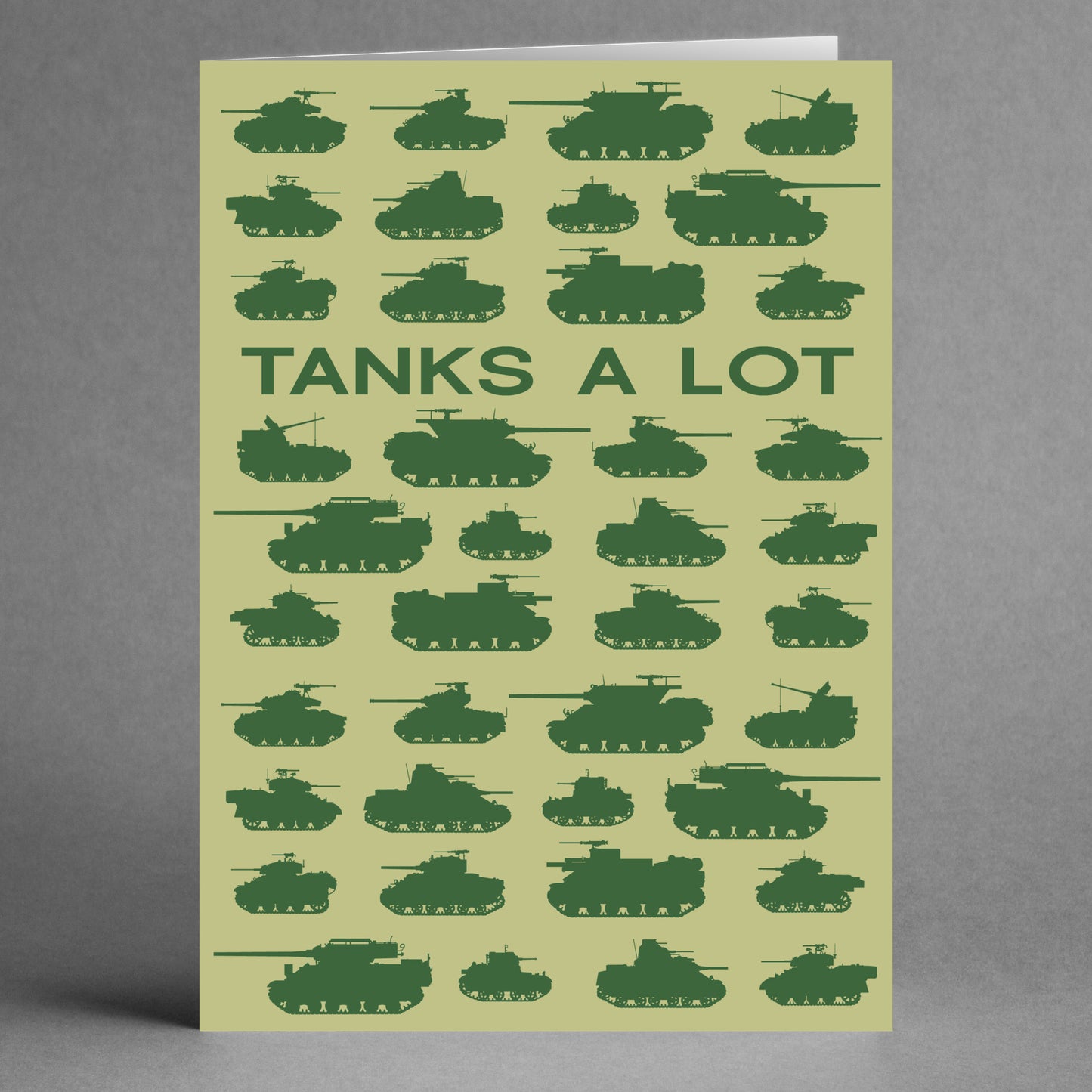 Treat someone to a playful expression of gratitude with the 'Tanks A Lot Funny Thank You Card' by Twisted Gifts, featuring a humorous design with green tank silhouettes on a light green background and the words "Tanks A Lot.