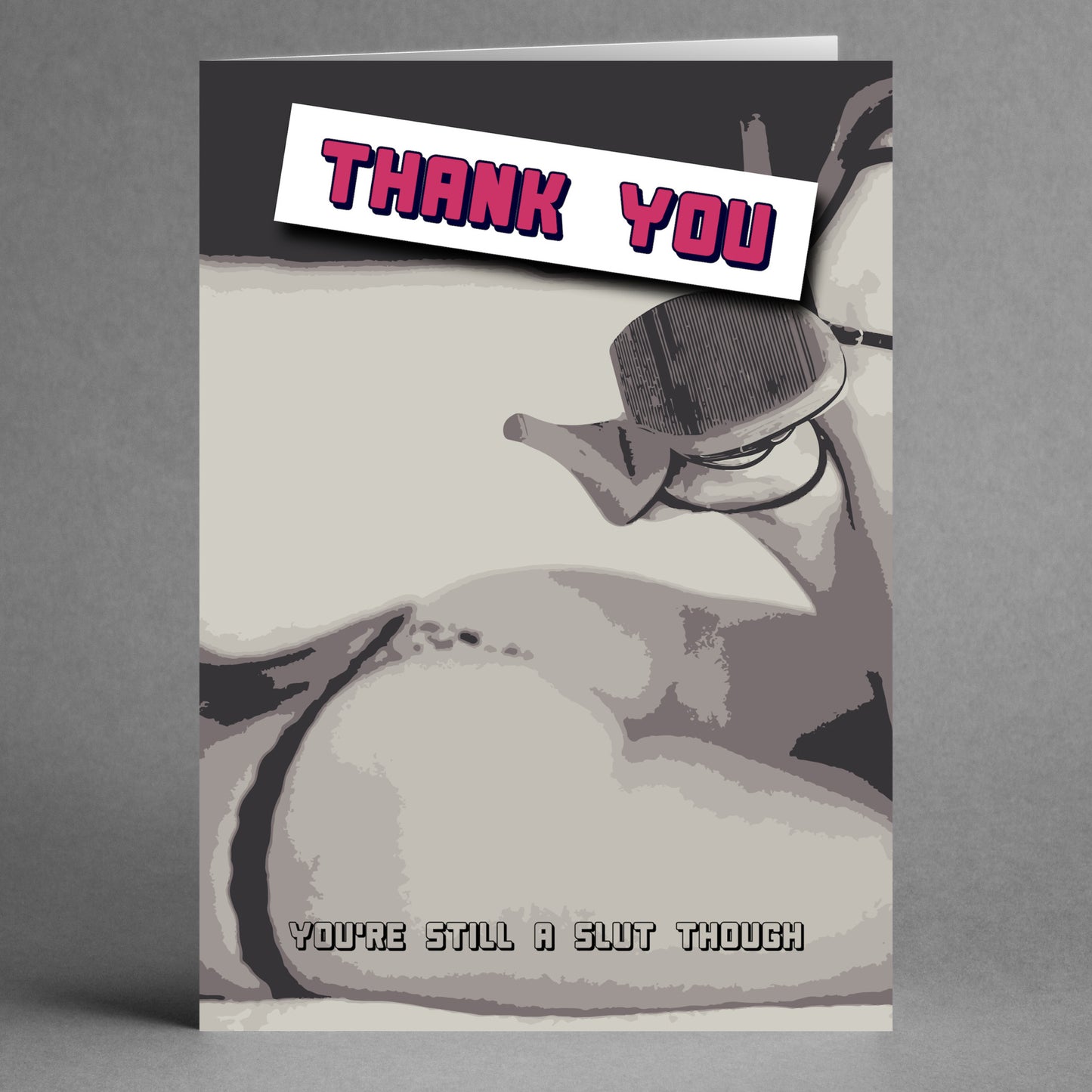 Introducing the "Still A Slut Insulting Thank You Card" from Twisted Gifts—a quirky greeting card that features a stylized image of sunglasses and a nude figure. The card humorously states, "THANK YOU," followed by the cheeky remark, "YOU'RE STILL A SLUT THOUGH." Perfect for those who appreciate a sassy touch in their gratitude.