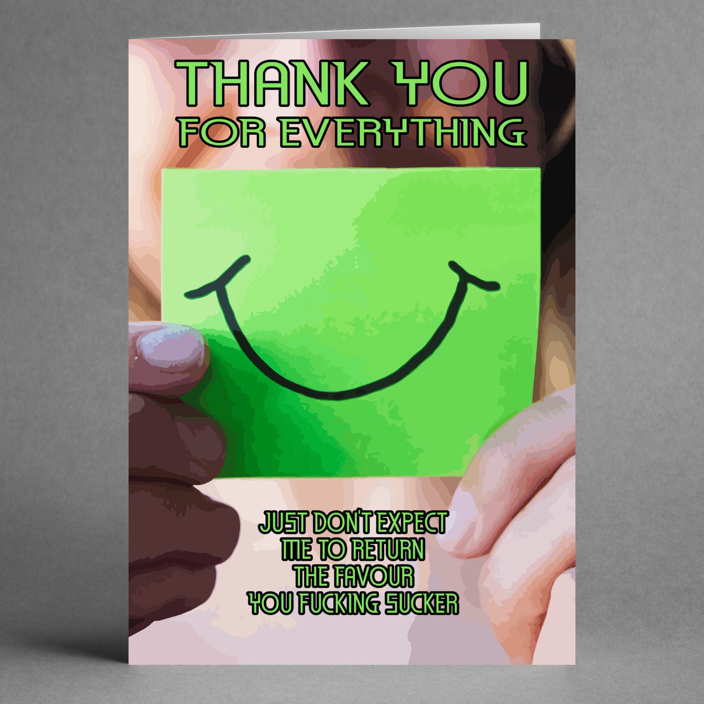 A humorous card from Twisted Gifts features a person holding a green paper with a smiley face alongside the text: "Thank you for everything. Just don't expect me to return the favor, you [expletive] sucker." This uniquely sassy greeting card, aptly named the Fucking Sucker Insulting Thank You Card, is perfect for expressing one-of-a-kind gratitude!