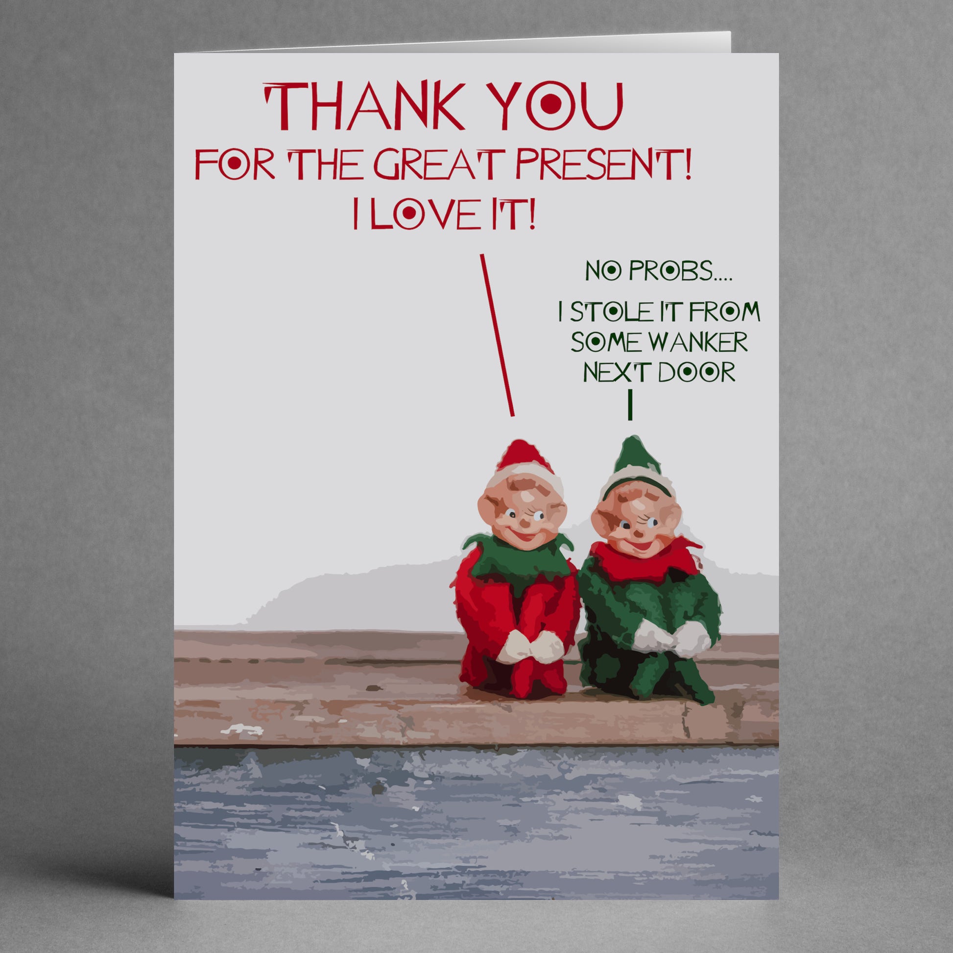 A humorous Christmas card from Twisted Gifts titled "Gnomes Funny Thank You Card" showcases two gnome-like elves sitting on a wooden surface. The text says, "Thank you for the great present! I love it!" and continues with, "No probs... I stole it from some wanker next door.