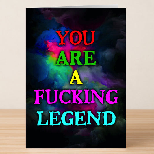 The Fucking Legend Funny Thank You Card by Twisted Gifts features "YOU ARE A FUCKING LEGEND" in bold, colorful letters on a dark, smoky multicolored background—perfect for making your gratitude unforgettable.