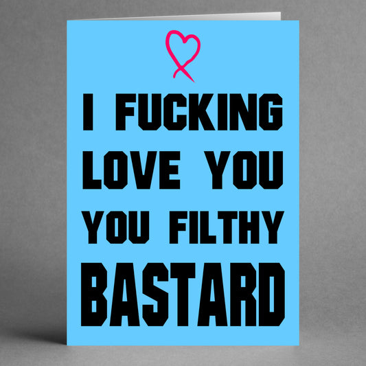 A cheekily rude Valentine's greeting card from Twisted Gifts, the Filthy Bastard Rude Greeting Card features bold black text that declares "I fucking love you, you filthy bastard," with a small pink heart above on a blue background.