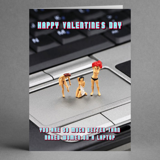 The Laptop Funny Valentine's Card by Twisted Gifts showcases miniature figurines of three women positioned on a laptop keyboard, accompanied by a witty message highlighting its appeal over "naked women on a laptop." This greeting card is ideal for the tech-savvy romantic seeking something distinctive.