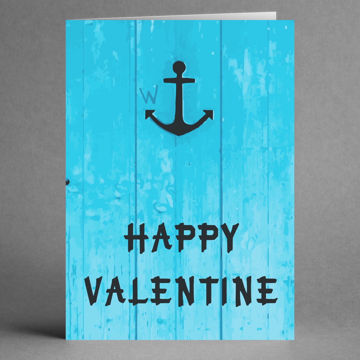 The W-Anchor Funny Valentine's Card by Twisted Gifts presents a delightful anchor design paired with the whimsical phrase "Happy Valentine" in bold, black letters.