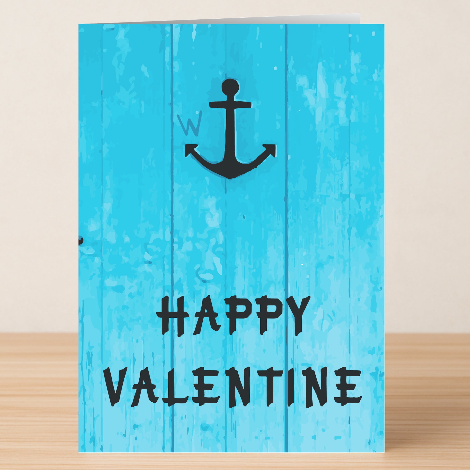 The W-Anchor Funny Valentine's Card by Twisted Gifts features a blue design with a black anchor and "HAPPY VALENTINE" message—perfect for sharing punny humor on Valentine’s Day.