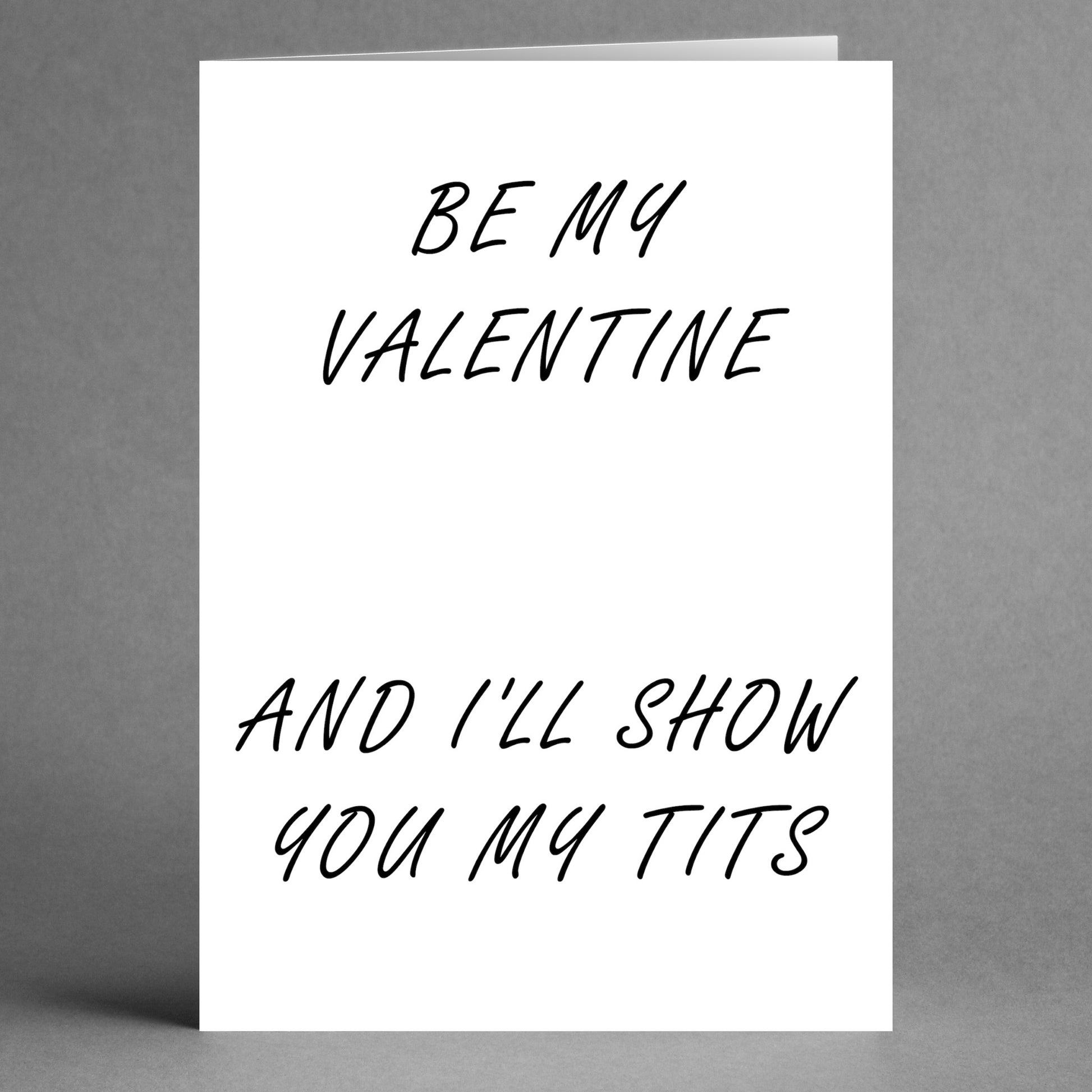 Introducing the Tits Rude Valentine's Card by Twisted Gifts: A playful greeting card with the cheeky message, "Be my Valentine and I'll show you my tits," elegantly printed in bold black text on a simple white background. Ideal for those who enjoy humor with a flirtatious edge.