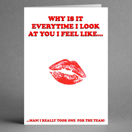 The Team Insulting Valentine's Card from Twisted Gifts features a playful red lipstick kiss at the center, with the humorous message: "Why is it every time I look at you I feel like... man! I really took one for Team Insulting Valentine's Card." It's a cheeky twist perfect for your favorite teammate!