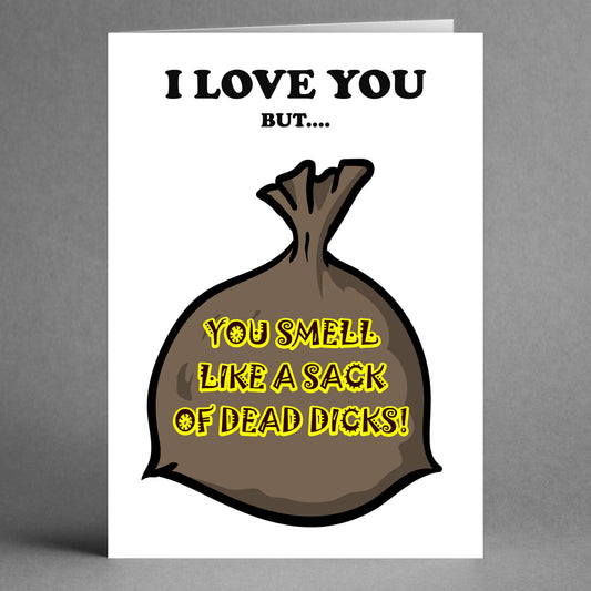 Introducing the Sack Very Twisted Valentine's Card by Twisted Gifts, a one-of-a-kind greeting card showcasing a gray bag design and the humorous message, "I LOVE YOU BUT... YOU SMELL LIKE A SACK OF DEAD DICKS!" Ideal for those who enjoy a good laugh!